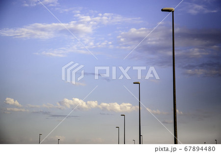 Lampposts with sky background Lampposts with sky background 67894480