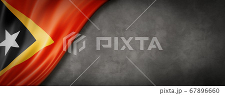 East Timor flag on concrete wall banner 67896660