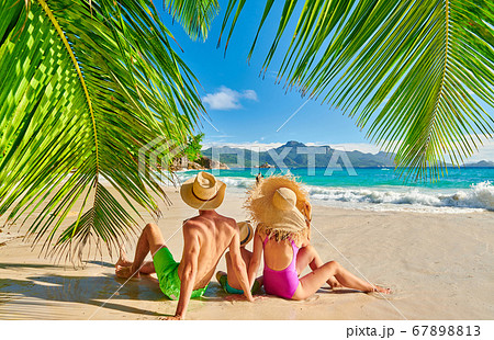 Family with three year old boy on beach. Family with three year old boy on beach. 67898813