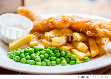 Traditional English Food such as Fish and Chips 67903005