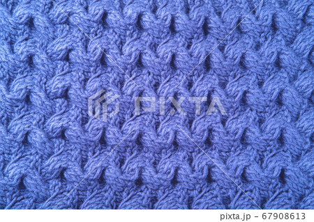 Wool knitted background in blue color. 67908613