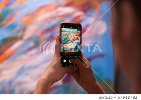 Taking photo of masterpiece 67918792