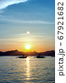 Beautiful sunset at the sea. a variety of colors and shades of the rising sun. 67921682