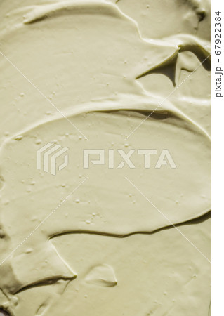 Green cosmetic clay texture close up 67922384