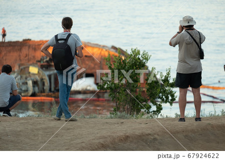 Locals watch salvaging of wrecked ship in Odessa 67924622