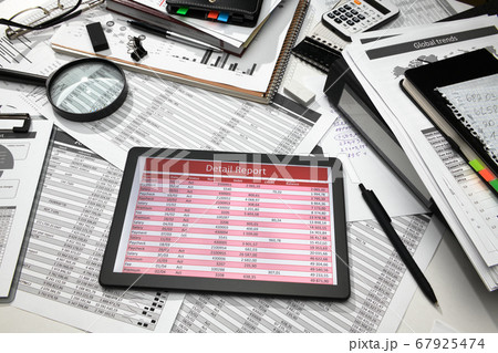 business office desk closeup - tablet computer business office desk closeup - tablet computer 67925474