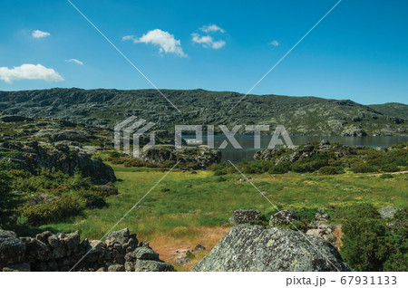 Hilly landscape with the Long Lake on highlands 67931133