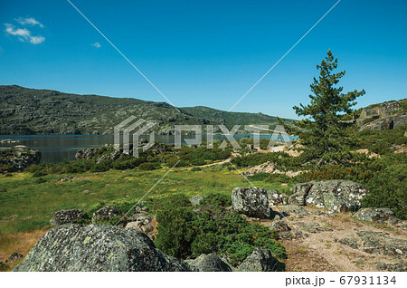 Hilly landscape with the Long Lake on highlands Hilly landscape with the Long Lake on highlands 67931134