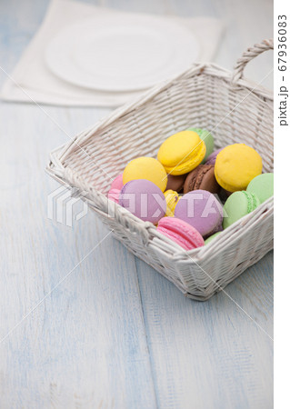 colorful cookies in a basket 67936083