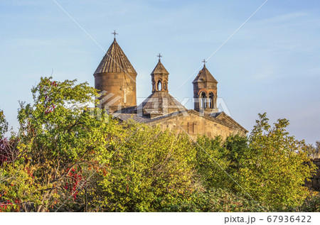 In the evening over the canyon of the Kasakh river overlooking the Sagmosavank monastery among the orchard located near the town of Ashtarak In the evening over the canyon of the Kasakh river overlooking the Sagmosavank monastery among the orchard located near the town of Ashtarak 67936422