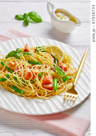 Salmon pasta with green beans and butter sauce 67936733