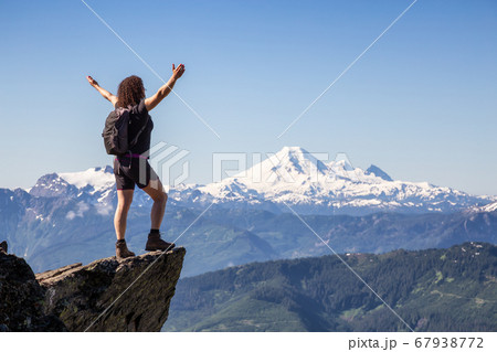 Girl hiking in Canadian Mountains Girl hiking in Canadian Mountains 67938772