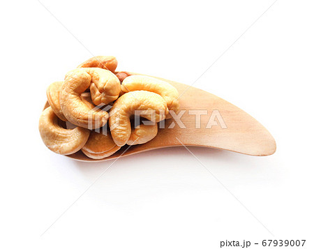 Wooden spoon with Dried cashew nuts Wooden spoon with Dried cashew nuts 67939007