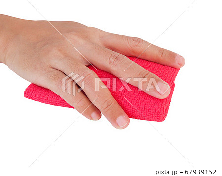 Top view of red cloth in hand to wipe clean 67939152