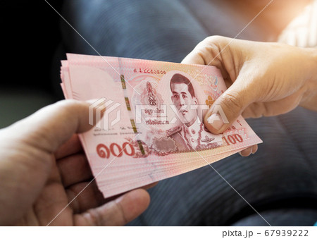 submitting Thai baht banknote money of thailand submitting Thai baht banknote money of thailand 67939222