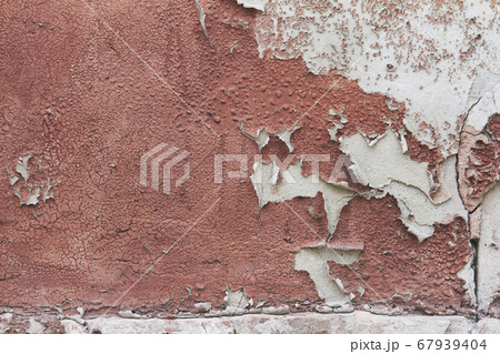 Old flaky cracked paint on gray wall, old paint 67939404