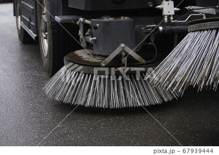 Close-up sweeper machine cleaning. Concept clean 67939444