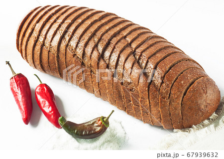Rye bread with red chili peppers and salt on a 67939632
