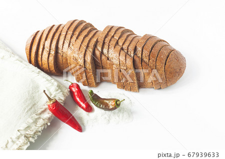 Rye bread with red chili peppers and salt on a 67939633