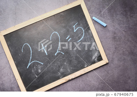 Mistake in math formula on chalkboard, education concept Mistake in math formula on chalkboard, education concept 67940675