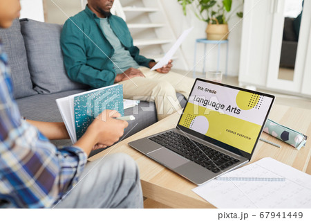 Child studying online on laptop 67941449