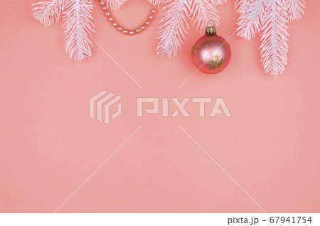 White Christmas tree branches, pink ball and White Christmas tree branches, pink ball and 67941754