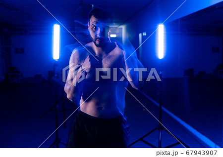 boxer in motion shooting blue light 67943907