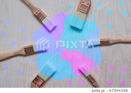 New brushes on plywood background 67944398