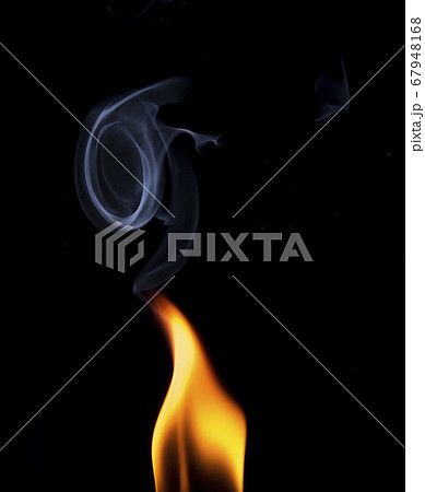 The movement of smoke and flame on a black background 67948168