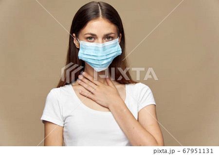 Pretty woman fashion clothes in a medical mask pandemic Pretty woman fashion clothes in a medical mask pandemic 67951131