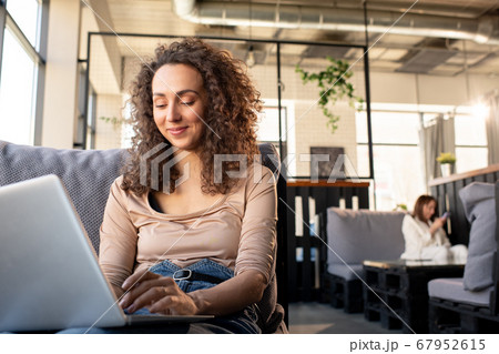 Pretty girl interacting on social media 67952615
