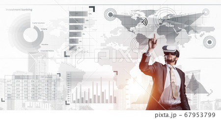 Experiencing virtual reality as new concept in technologies for business. Mixed media Experiencing virtual reality as new concept in technologies for business. Mixed media 67953799