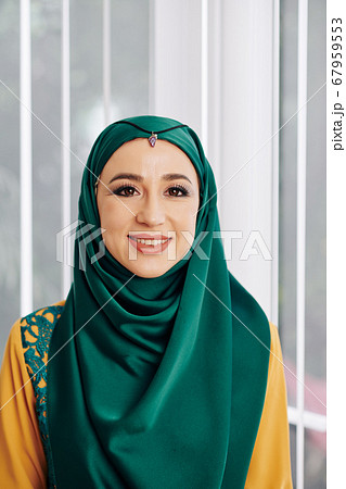Muslim woman in traditional hijab 67959553