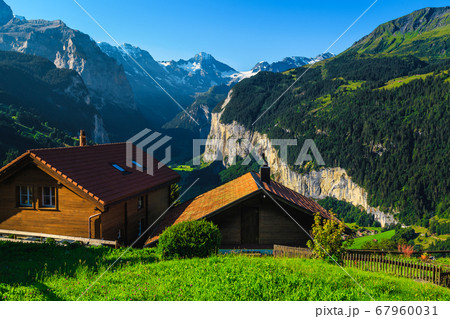 Wooden houses on the hill with great views, Wengen, Switzerland Wooden houses on the hill with great views, Wengen, Switzerland 67960031