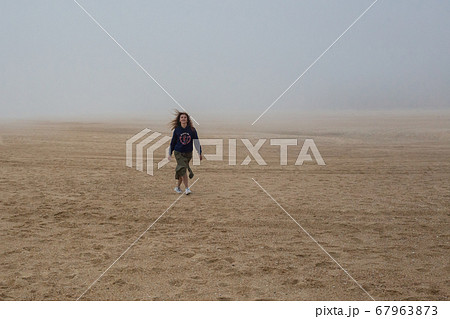 Sea and sandy beach in dense fog, autumn day Sea and sandy beach in dense fog, autumn day 67963873