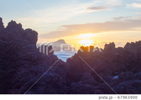Lava stones on the beach of Piscinas Naturais Biscoitos. Atlantic Ocean. Terceira Azores, Portugal. Lava stones on the beach of Piscinas Naturais Biscoitos. Atlantic Ocean. Terceira Azores, Portugal. 67963900