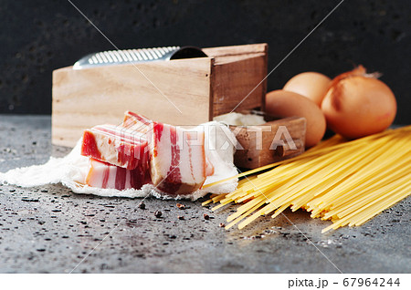 Ingredients for making pasta carbonara 67964244