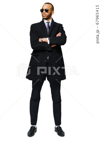 full length studio shot of a african-american businessman wearing coat Isolated on white background full length studio shot of a african-american businessman wearing coat Isolated on white background 67965415