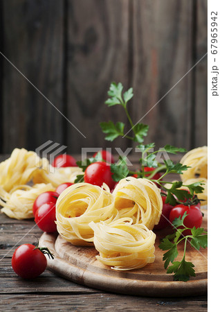 Ingredients for cooking pasta and tomato on the 67965942