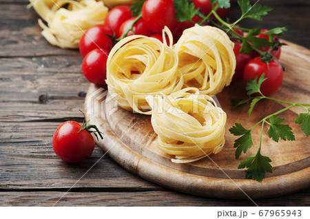 Ingredients for cooking pasta and tomato on the Ingredients for cooking pasta and tomato on the 67965943