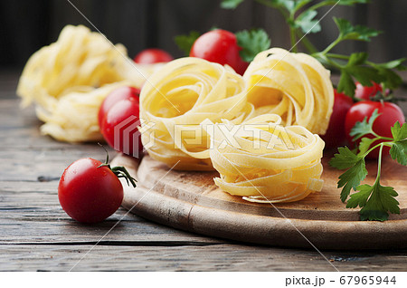 Ingredients for cooking pasta and tomato on the Ingredients for cooking pasta and tomato on the 67965944