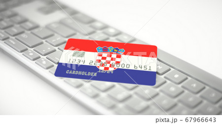 Plastic bank card depicting flag of Croatia on computer keyboard. Fictional numbers Plastic bank card depicting flag of Croatia on computer keyboard. Fictional numbers 67966643