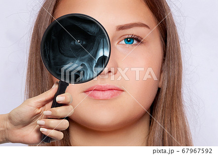 X-ray with a magnifying glass from the face part X-ray with a magnifying glass from the face part 67967592