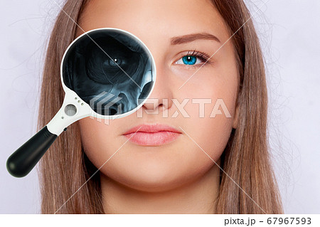 X-ray with a magnifying glass from the face part X-ray with a magnifying glass from the face part 67967593