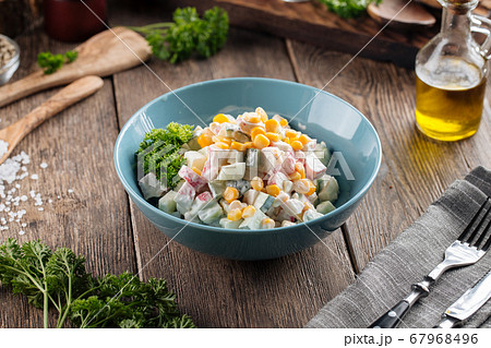 Russian salad with crab sticks and corn  67968496