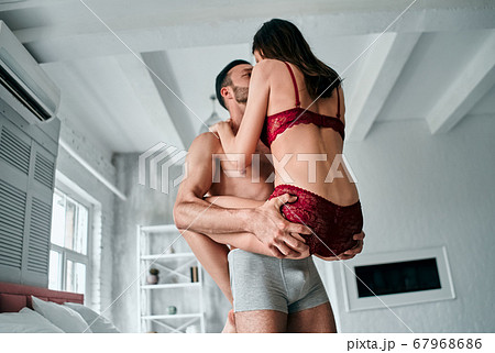 Premium Photo  The man and woman in underwear playing in the room