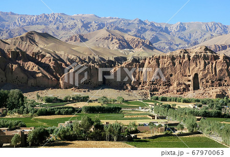 Bamyan (Bamiyan) in Central Afghanistan. This is a view over the Bamyan (Bamiyan) Valley showing the small Buddha niche in the cliff. The Buddhas were destroyed by the Taliban. UNESCO site Afghanistan 67970063
