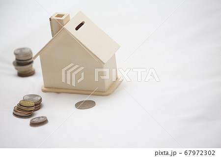 saving the money into the house on the bed saving the money into the house on the bed 67972302