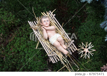 A baby Jesus figure on Christmas 67975471