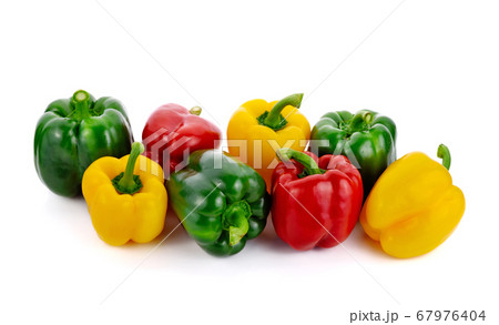 Fresh sweet peppers isolated on white background Fresh sweet peppers isolated on white background 67976404